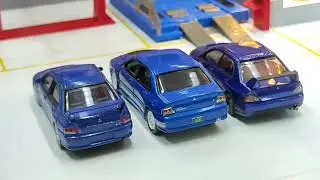 Autoart Evo7 vs Johnny Lightning Evo8 vs Peako Yes Evo9 (All Blue 1/64)
