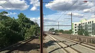NJT express train passes Rahway station