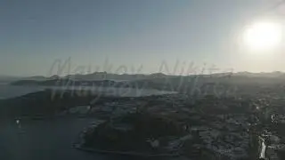 D-Log M. Bodrum, Turkey. Aerial drone view of peaceful landscape with green hills meeting the sea...