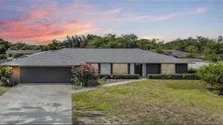 1011 BURRISRIDGE DRIVE, LAKELAND, FL Presented by Melanie Carney.