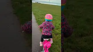 Aria trying out the new bike with stabilisers at  Portrush December 24 #learningtocycle