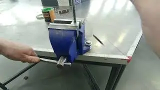 Tapping a hole with an M10 tap