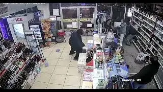 Liquor store customer fires bottles of red wine at employees