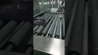 Glass roller coating machine for refrigerator glass panel