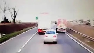 Impatient Driver Attempts To Pass HGV's