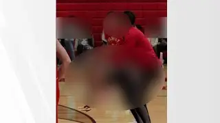 Altered photo of mother shown at her son's high school basketball game sparks chaos