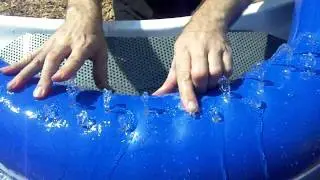 Water instrument in playground (playing The Cat Came Back)