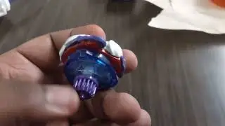 Futuristic left spin beyblade hand spinning in Hugs Cafe for fun 🐲 
