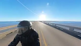 Crossing the San Luis Pass bridge to Galveston Island on Moto Guzzi V7