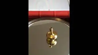 Prometheus Lambda solid brass spin tops