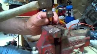 Making your own flint knapping tools. How to dome a copper cap.