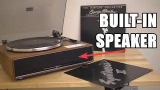 Listen to old or new music with this 1 by ONE record player with Built-in Speakers!