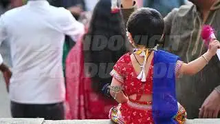 Child celebrating Ganesh Chaturthi festival, wearing traditional Indian clothing in India