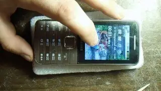 Samsung gt-s5610 - Не слышен разговорный динамик, чистка.