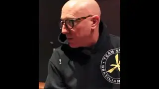 Why Tool's Maynard performs from back of stage answered!