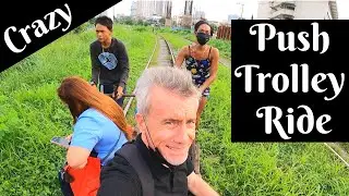 CRAZY PUSH TROLLEY RIDE on Train Tracks in Manila.