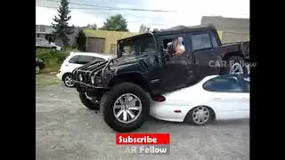 Hummer H1 open top stuck on a ford taurus | Car Fellow