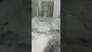 White marble epoxy bathroom floor by New Finish of Saginaw