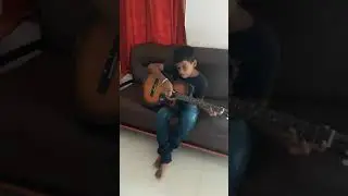 Prati playing Guitar