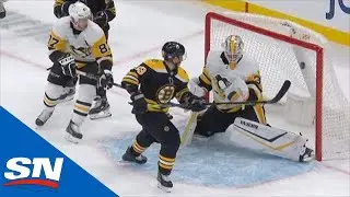 Brad Marchand Bats Puck Out Of The Air Into The Penguins' Net