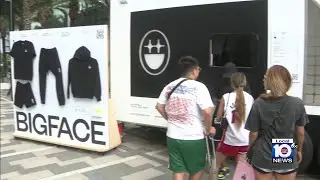 Fans enjoying Big Face Coffee pop-up outside Kaseya Center