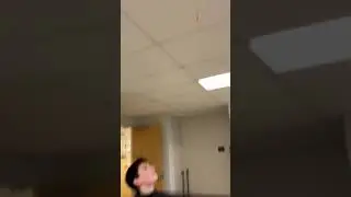 Sticking paper dart in ceiling