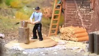 Bewegte H0 Miniaturwelt - Holzhacker auf der Modellbahn