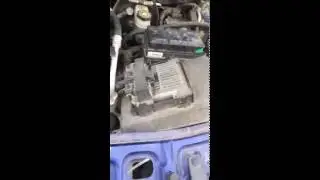 where is the battery on 2005 chevy equinox