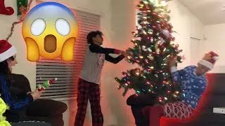 BAD CHRISTMAS PRESENTS PRANK ON SISTER! *GONE WRONG* (SHE THROWS TREE!)