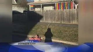 Neighbors fly rainbow flags in support of woman who found animal bones, nails near home