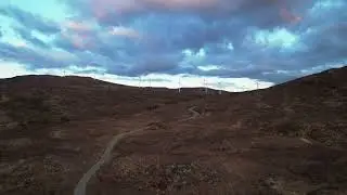 Drone View: Wind Wind turbine power  farm in Highland Scotland UK