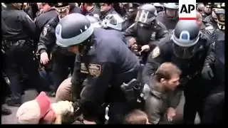 Protesters block traffic in financial district, clash with police