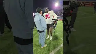 Scott talks with Markel Bell OL from Miami at the Senior Bowl Practice