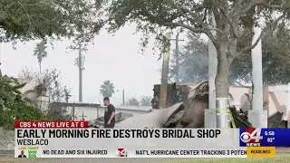 Early morning fire destroys bridal shop