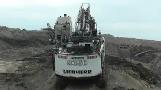 Big Digger Liebherr R 9350 Excavator Climbing to the Top Before Starting Operation