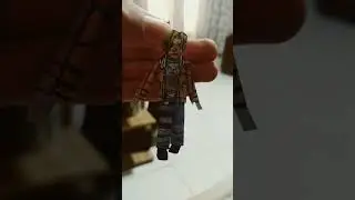 boneco do Leon de resitnt evil 4