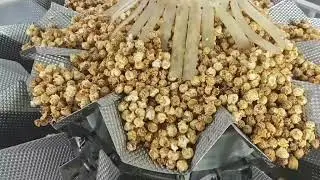 Машина для упаковки попкорна с многоголовочным весовым упаковщиком