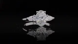 1.50 ct Oval E SI2 GIA Diamond Ring with 0.34 ct Pear Sides in 18K White Gold - Orogem Jewelers