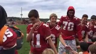 New Brighton High School Football players greeting NBES kids! 10-2-15 Pep Rally K-12