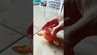 Mainan anak kepiting (tekan jalan)