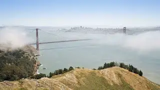 Timelapse of advection fog rolling in under the Golden Gate Bridge, San Francisco