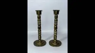 Surprisingly heavy Pair of solid brass candlesticks,