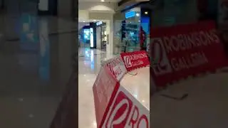 Walking outside Comic Odyssey in Robinsons Galleria near SM Megamall