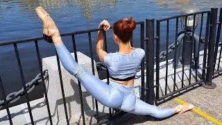 Ballerina doing oversplits on the promenade. Flexshow ballet.