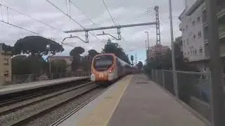 Entrando/ saliendo de la estaci&oacute;n de Sant Feliu Rodalies de Catalunya Civia 465 linea R4