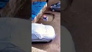 Unbelievable Incident Car Vanishes into Sinkhole whilst Parked in Carpark... #car #youtubeshorts