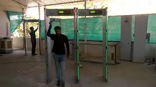 Four zone walk through door frame metal detector