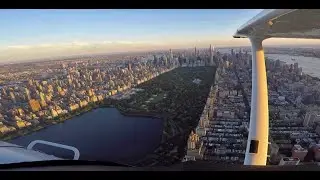 Flight over Hudson River & Central Park at sunset.