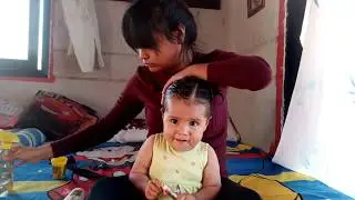 Peinado hermoso para bebé de cabello corto