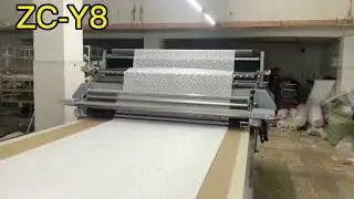 Automatic fabric spreading machine